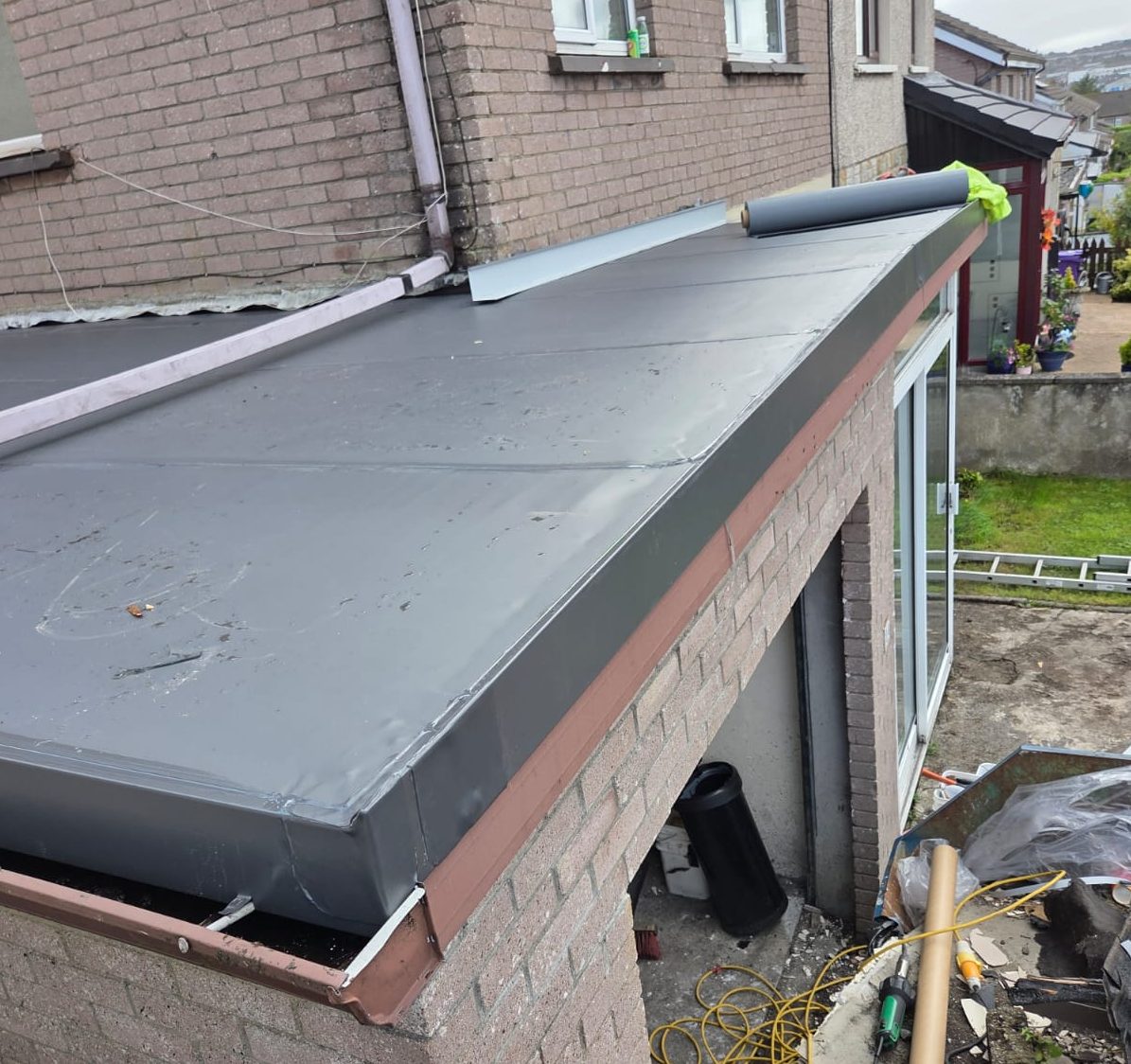 Flat roof installation by GN Roofing
